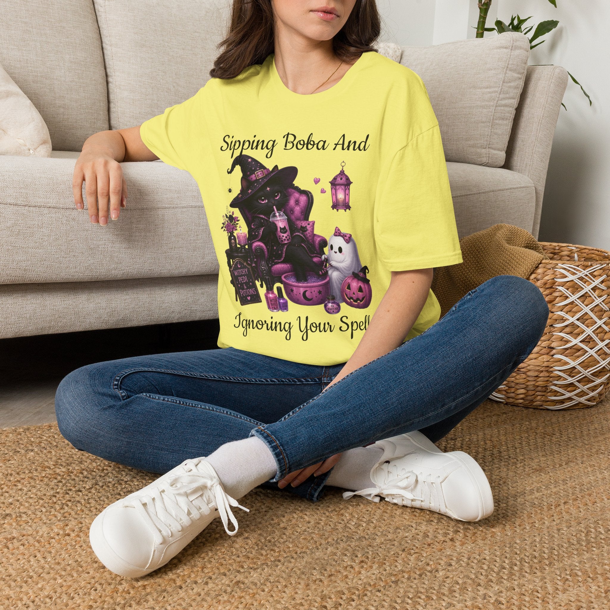 Witch Cat Graphic T-Shirt — Cute Halloween Cat with Lantern & Pumpkin