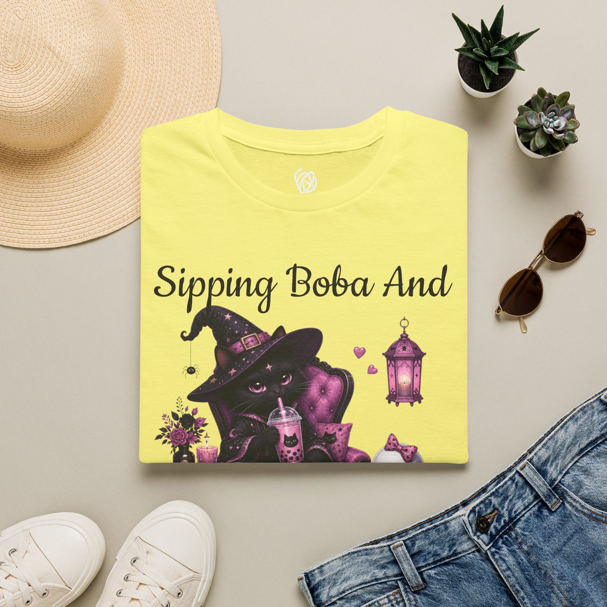 Witch Cat Graphic T-Shirt — Cute Halloween Cat with Lantern & Pumpkin